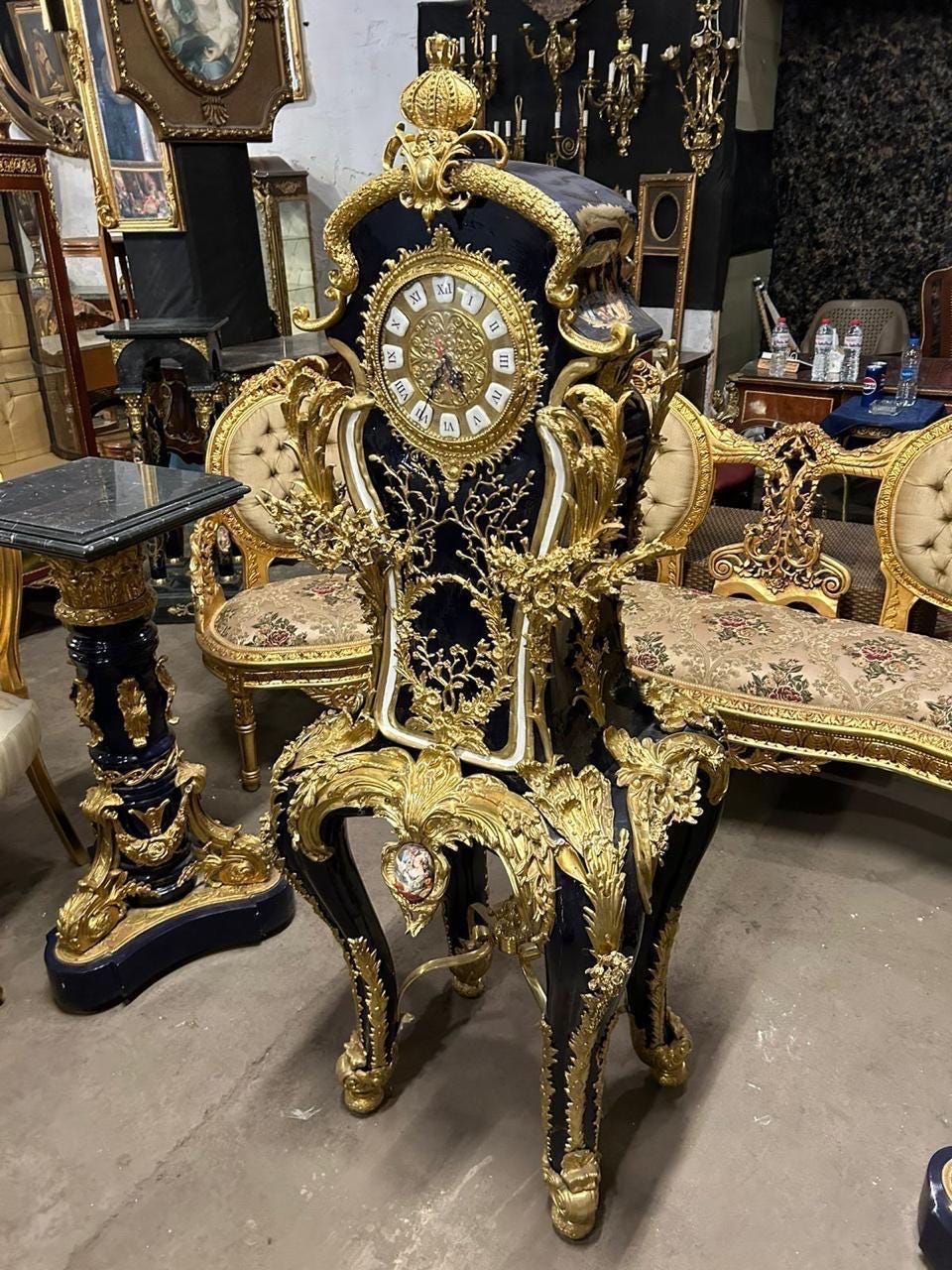 Exquisite French-Style Ornamental Clock with Gold Leaf Detailing, Intricate Floral Motifs, and Royal black Finish