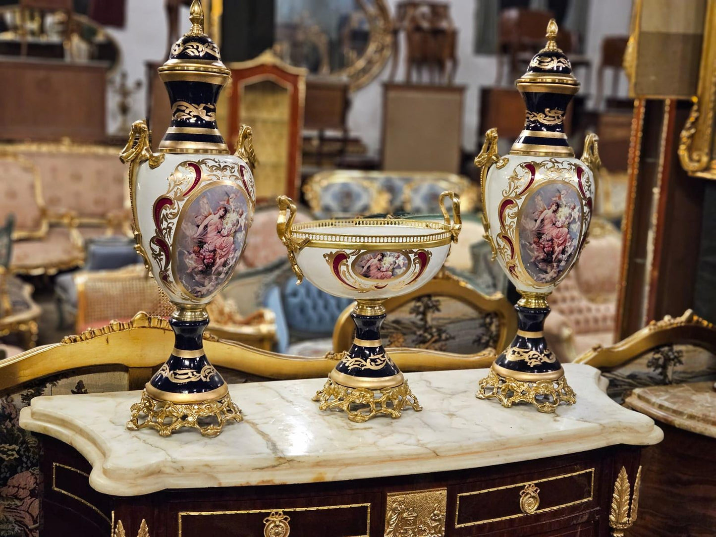 Pair of Large Hand-Painted Porcelain Urns with Gilt Bronze Bases – French Rococo Style