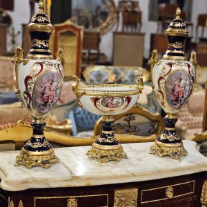 Pair of Large Hand-Painted Porcelain Urns with Gilt Bronze Bases – French Rococo Style